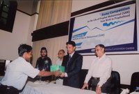 Honorable State Minister for Education, Mr. Ehsanul Hoque Milan giving prizes to the winners of the essay competition contest, organized by the Institute of Hazrat Mohammad (SAW), for school children, on the life of Prophet Mohammad (SAW).