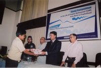 Honorable State Minister for Education, Mr. Ehsanul Hoque Milan giving prizes to the winners of the essay competition contest, organized by the Institute of Hazrat Mohammad (SAW), for school children, on the life of Prophet Mohammad (SAW). 